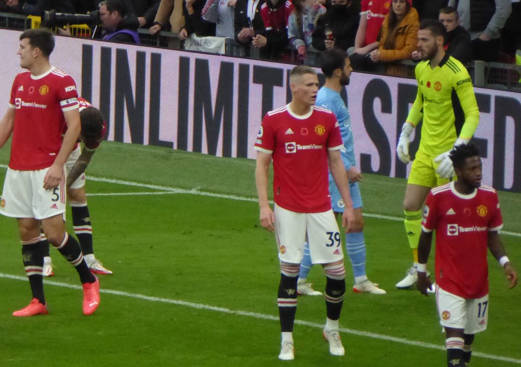 Joueurs de Manchester United et Manchester City lors d’un derby mancunien